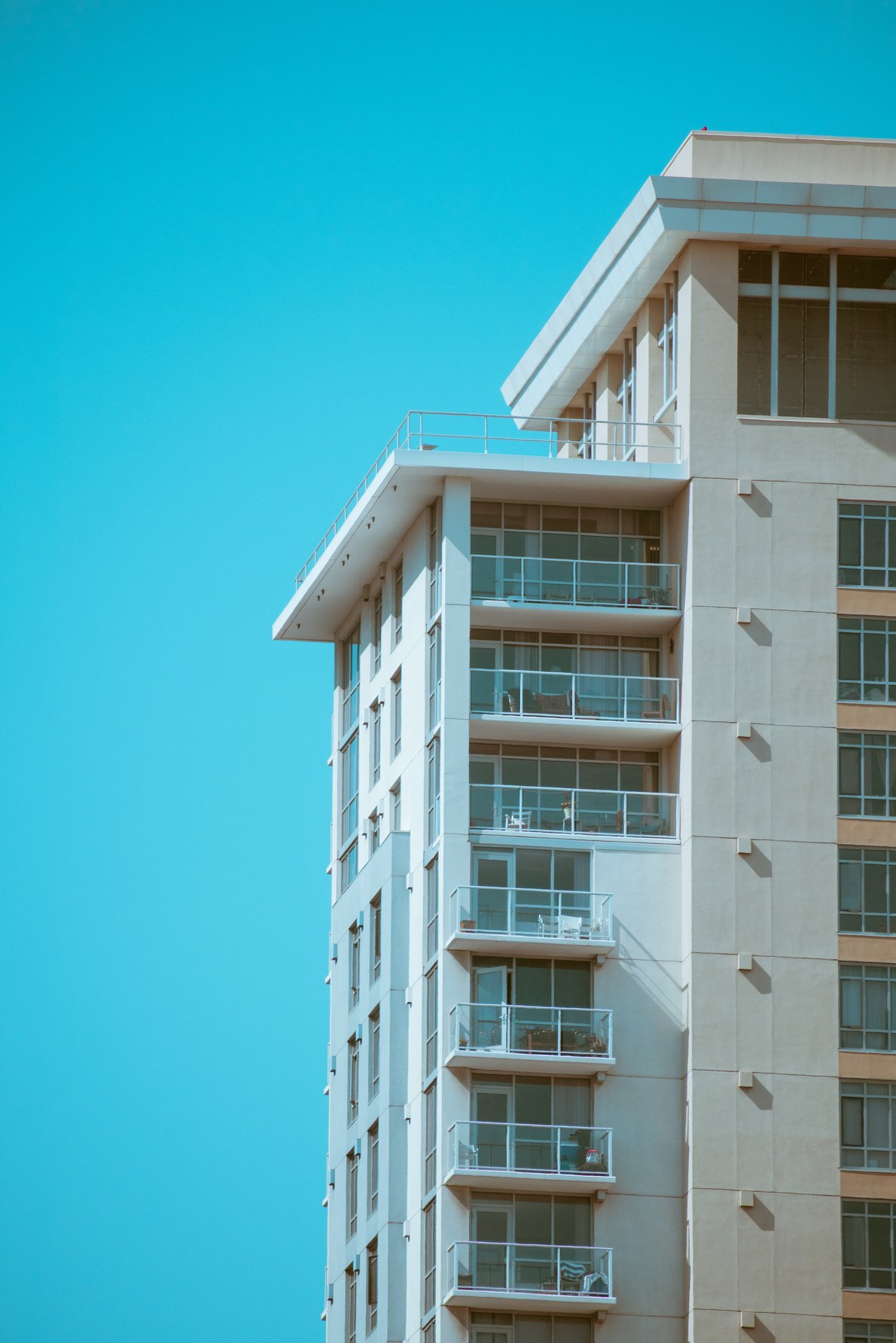 A Condominium Building Under Blue Sky